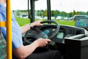 Bus,Driver,Sitting,In,His,Bus,On,Tour