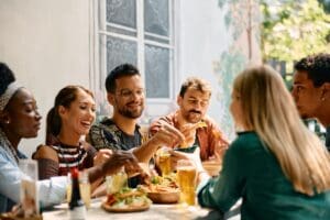 Group,Oy,Young,Happy,People,Eating,Mexican,Food,In,A