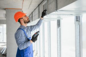 Industrial,Theme.,Warehouse,Heating,And,Cooling,System,Installation,By,Professional