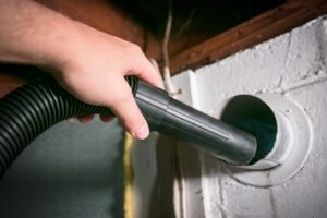 Vacuum,Cleaning,Out,Home,Dryer,Vent,To,Remove,Built,Up