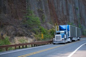 Big,Rig,American,Bonnet,Semi,Truck,With,Spoiler,Vertical,Exhaust