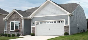 house with garage and shake siding left photo